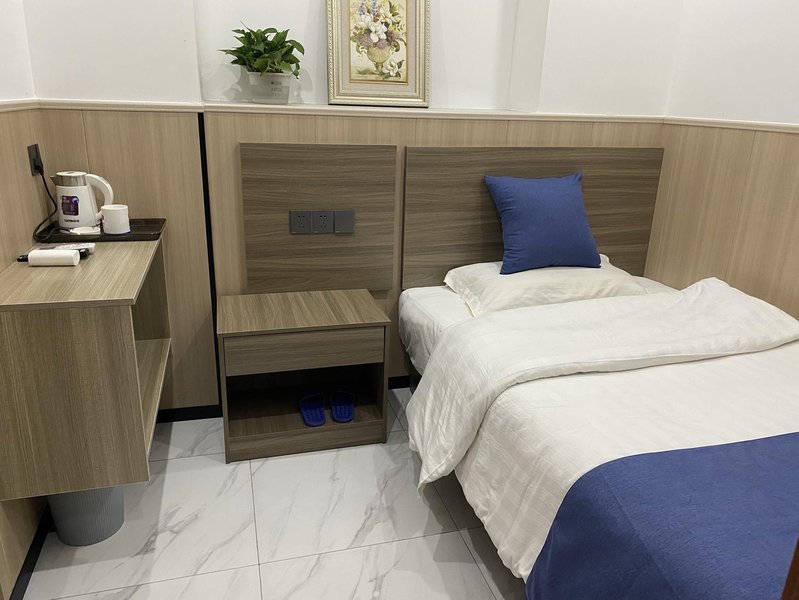 Guangming Hotel Guest Room