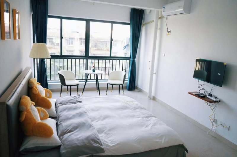 Jinghong Jiujiu Time Apartment Guest Room