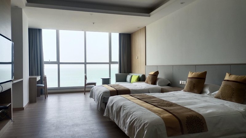Naxianghai Blue Ocean Apartment Hotel (Rongcheng Intercontinental Holiday Plaza) Guest Room