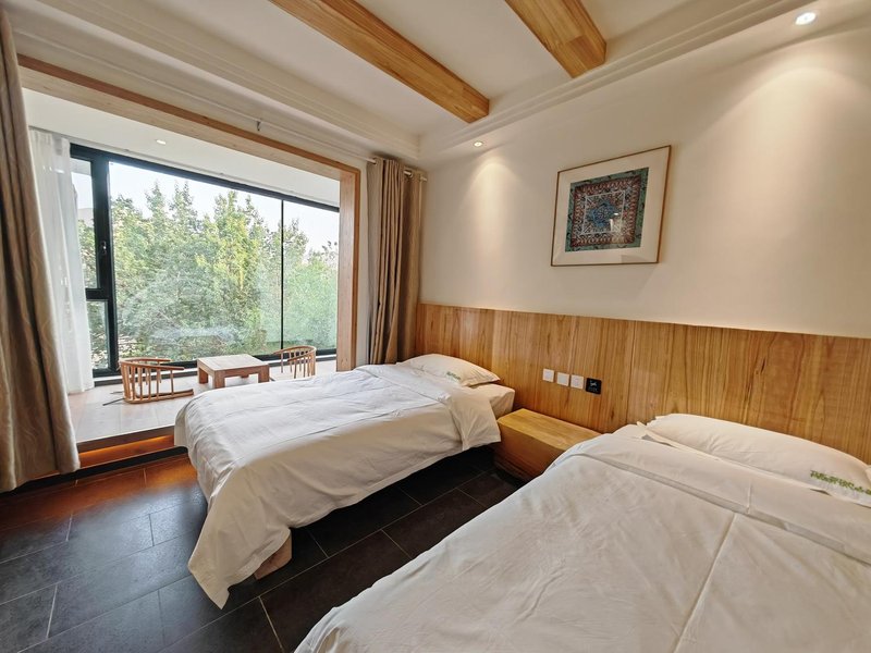 Xinghehotei Guest Room