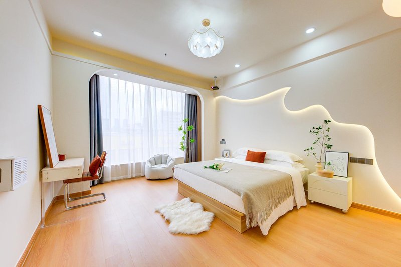 Left Bank Fancheng Meisu Hotel (Gongbei Port High-speed Railway Station) Guest Room