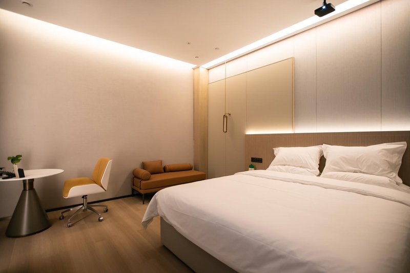 Peninsula Impression Smart Hotel (High-speed Railway New Area) Guest Room