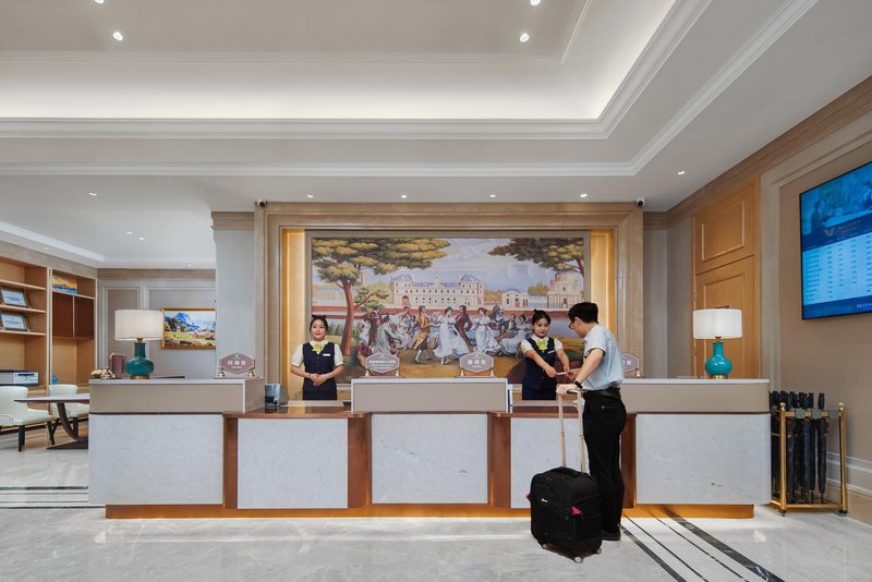 Vienna Hotel (Yuzhou Yuxin District Yu Square Branch) Lobby