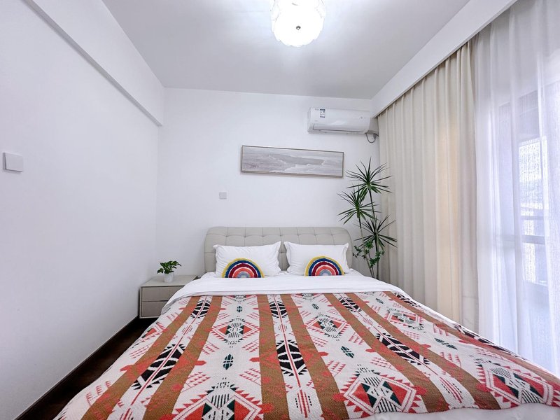 Xishuangbanna Jinghong Mujing Light Luxury Homestay (Gaozhuang Star Night Market) Guest Room