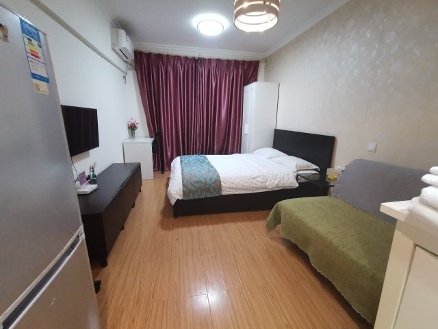 Xingfu Huafu Family ApartmentGuest Room