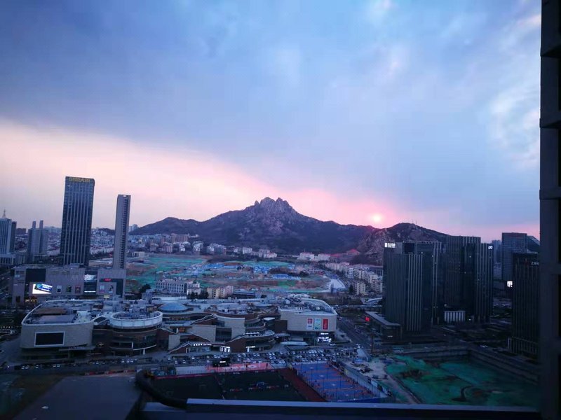 Qingdao Yilan Xinsu Hotel (Shilaoren bathing beach, International Convention and Exhibition Center) Over view