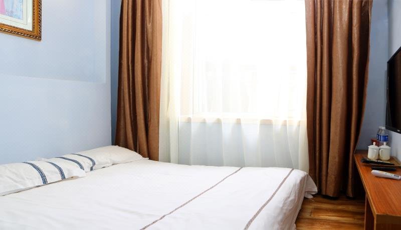 Dunhua small cube Hotel Guest Room