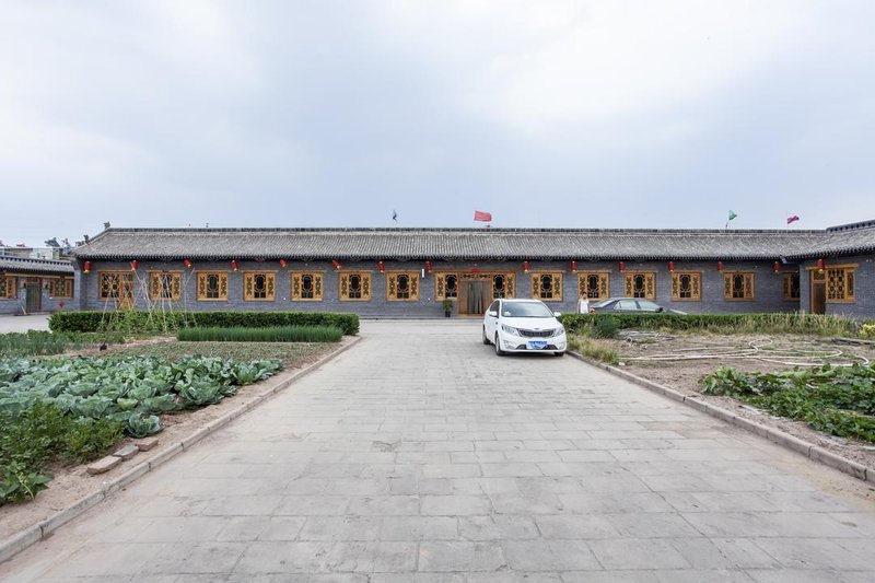 Tuwo Holiday Hotel (Pingyao Ancient City East Gate) Over view