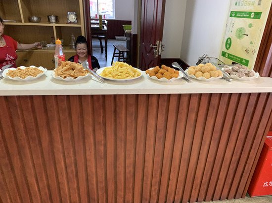 7 Days Premium Xinyang Railway Station Culture CenterRestaurant