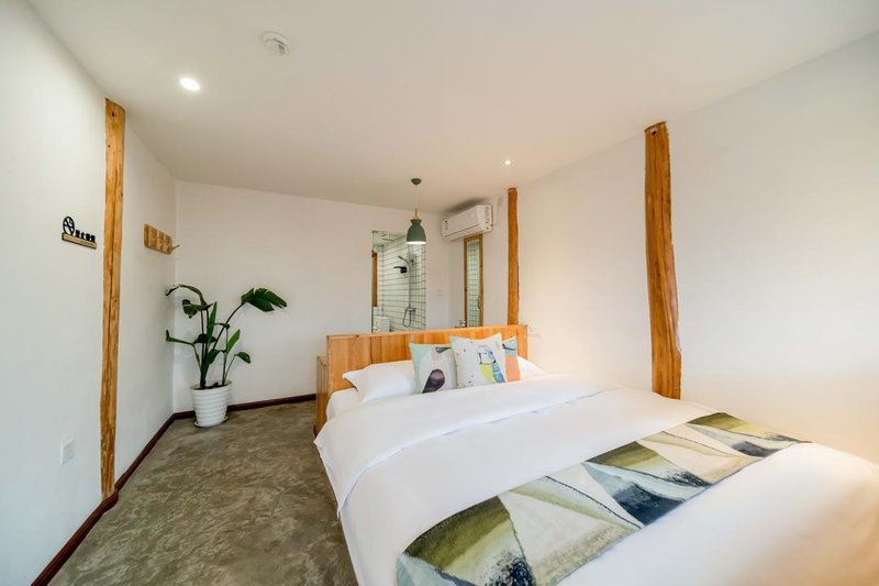 Jiuqi Xijiang Qijian Hostel Guest Room