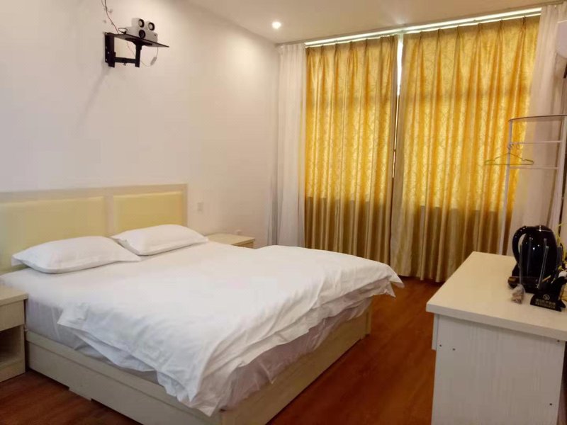 JiKaiLong Hotei ApartmentGuest Room