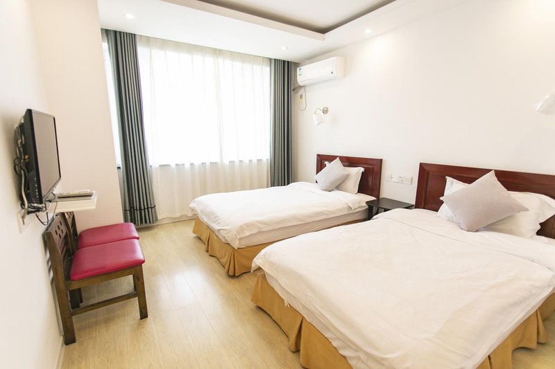 Mutian Holiday Apartment (Weihai International Bathing Beach) Guest Room