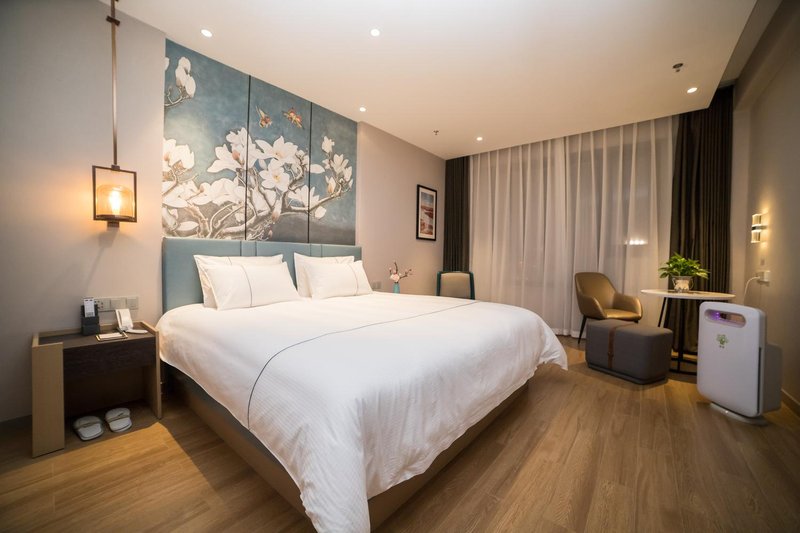 Magnolia Hotel (Xingcheng Central Plaza Wenquan Street store) Guest Room