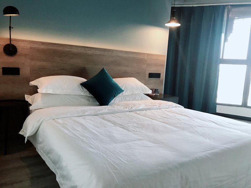 Jiangnan Yiqi Hotel Guest Room