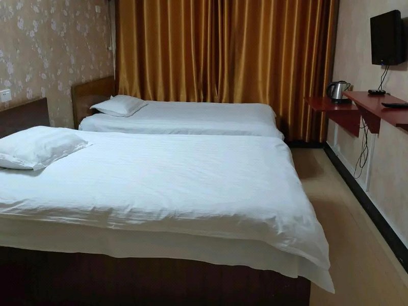 Huanggang Quanxing HotelGuest Room