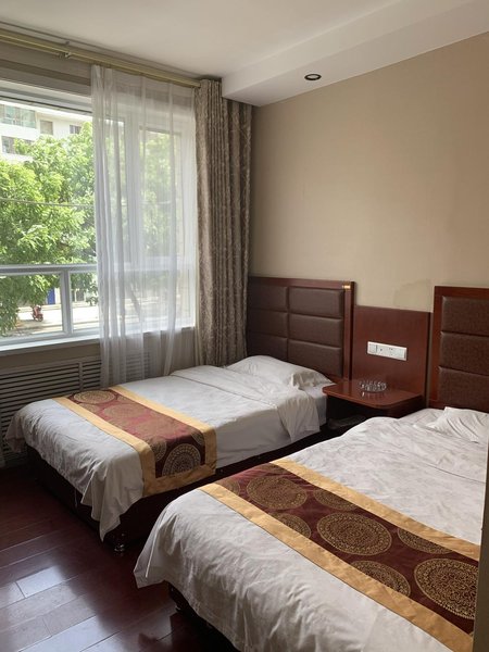Jiuquan Nongken HotelGuest Room