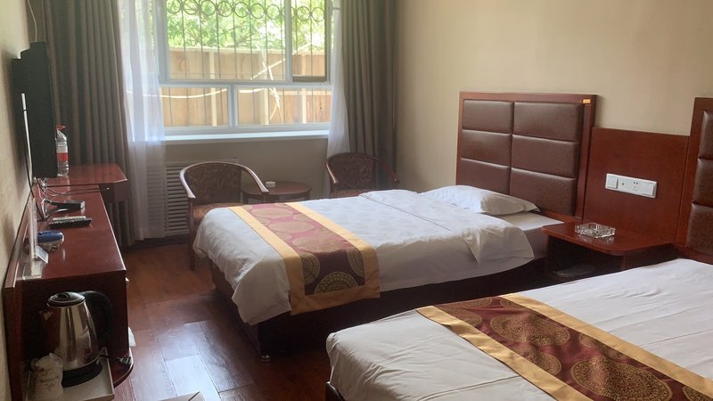 Jiuquan Nongken HotelGuest Room