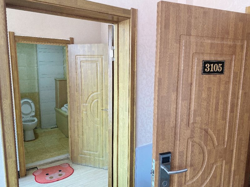 Huadu Business Inn Guest Room